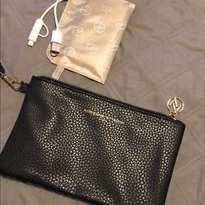 Adrianne Vittadini Wristlet in black.